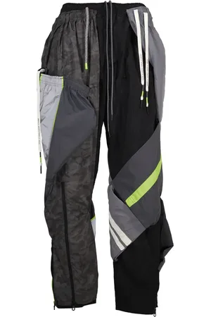 MOSTLY HEARD RARELY SEEN Pantalones joggers deconstruidos