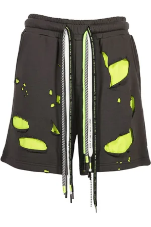 MOSTLY HEARD RARELY SEEN Bermudas con detalles rasgados