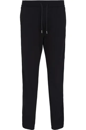 Armani Exchange Pantalones de chándal con franjas del logo
