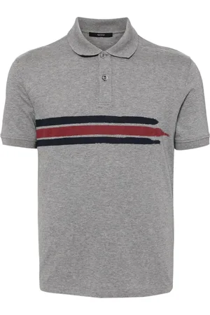 Gucci Polo con estampado a rayas