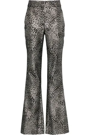 GENNY Pantalones con estampado animalier