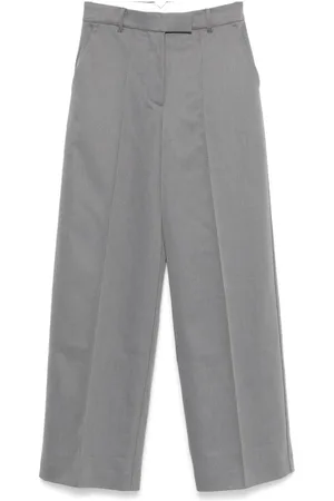 REMAIN Pantalones a rayas