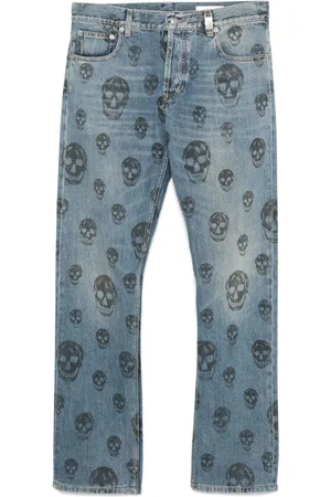 Alexander McQueen Vaqueros con calavera estampada