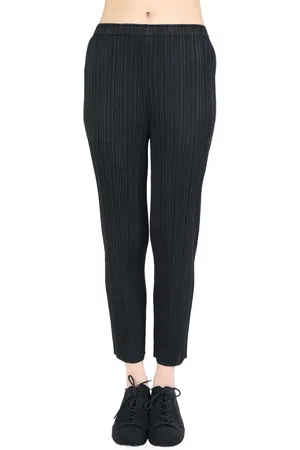 PLEATS PLEASE ISSEY MIYAKE Pantalones ajustados con pinzas