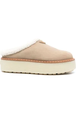 Prada Mules con tacón de 50 mm y logo esmaltado