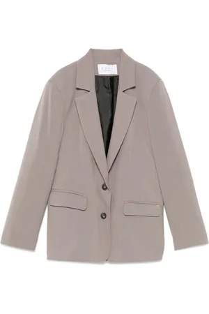 Kaos Chaqueta con placa del logo