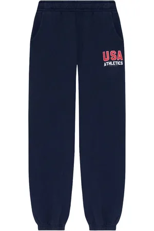 Sporty & Rich Pantalones elásticos con logo estampado