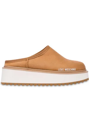 Moschino Mules con plataforma del logo