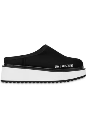 Moschino Mules con plataforma del logo estampado