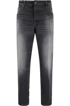 PT Torino Vaqueros slim con detalle desgastado