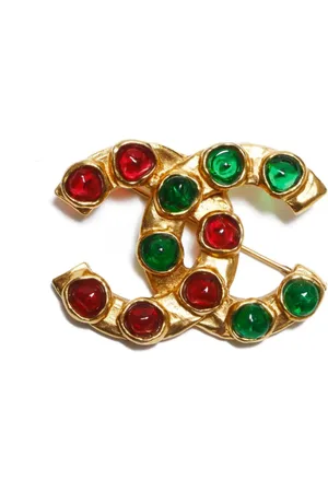 CHANEL Broche con logo CC 1980