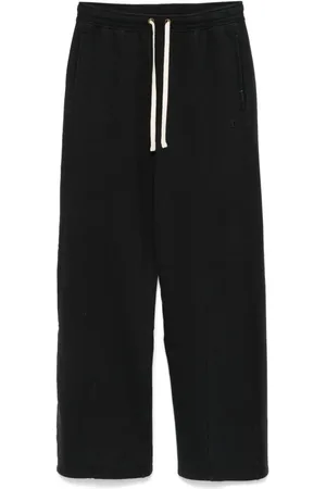 Champion Pantalones de chándal anchos