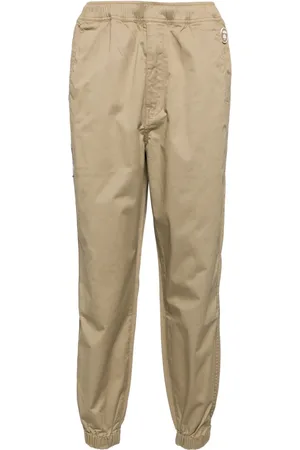 A Bathing Ape Pantalones Moonface con logo