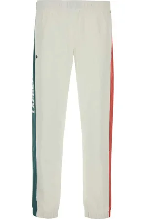 Lacoste Pantalones de chándal con rayas laterales