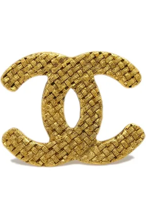 CHANEL Broche con logo CC 1994