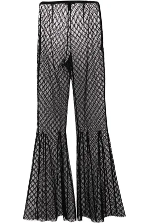 Kiki de Montparnasse Pantalones acampanados con diseño ajustado