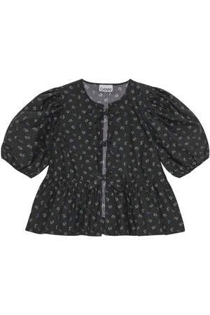Ganni Blusa con peplum