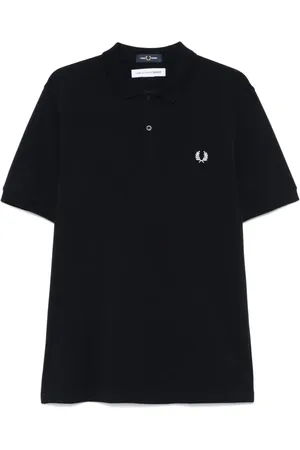 Comme des Garçons Polo con eslogan estampado de x Fred Perry