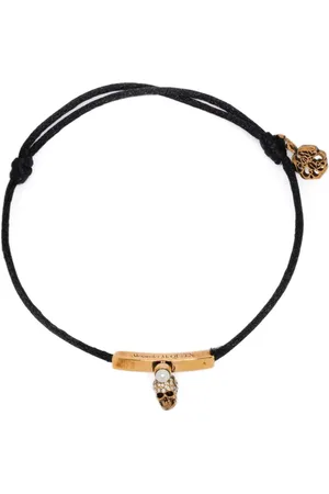Alexander McQueen Pulsera con charm de calavera