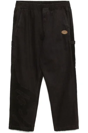 A Bathing Ape Pantalones rectos con parche del logo