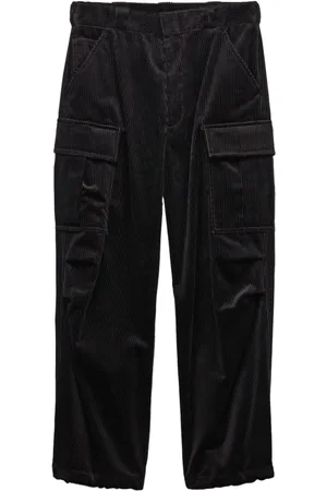 Prada Pantalones ajustados con logo triangular