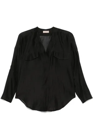BLANCA Blusa con cuello en V