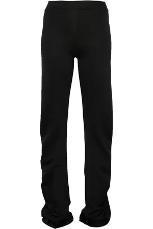 Jade Cropper Pantalones stretch con diseño retorcido