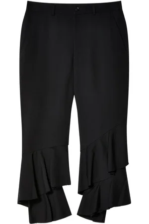 Comme des Garçons Pantalones a capas