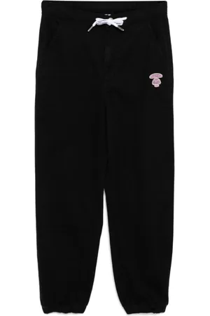 A Bathing Ape Pantalones ajustados con logo