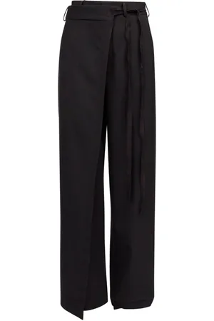 Maison Margiela Pantalones acampanados con costuras del logo