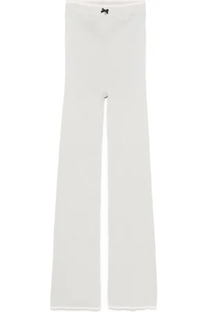 ROTATE Leggins de canalé acampanados