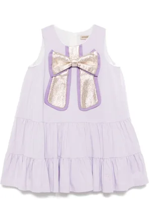 HUCKLEBONES LONDON Vestido a capas con volantes y lazo en tono dorado