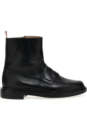 Thom Browne Botines con estilo de mocasines