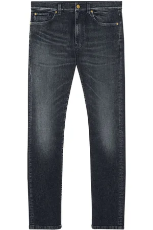 VERSACE Vaqueros slim con bordado Medusa