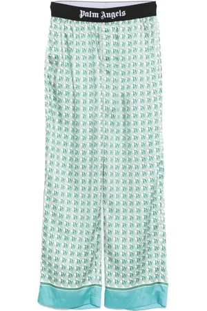 Palm Angels Pantalones con monograma estampado