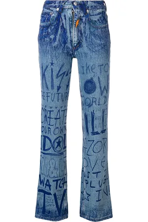 WALTER VAN BEIRENDONCK Vaqueros con motivo escrito