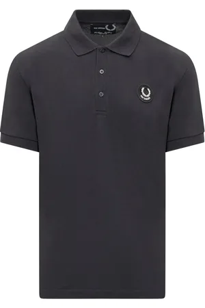 Fred Perry Polo con parche del logo