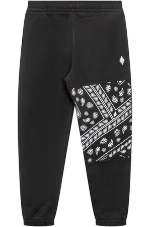MARCELO BURLON Pantalones de chándal con estampado bandana