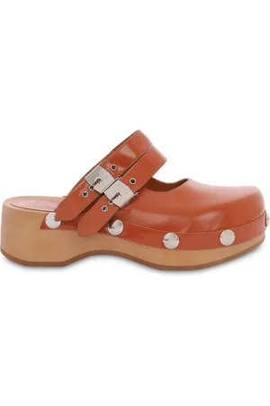 Serafini Mules con hebilla doble