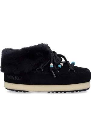 Moon Boot Mules con detalle de cuentas