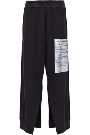 Maison Margiela Pantalones acampanados con números