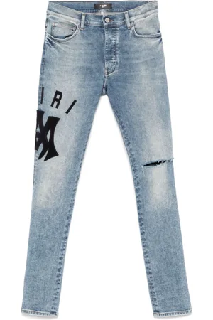 AMIRI Vaqueros skinny con aplique del logo