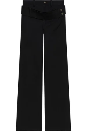 Courrèges Vaqueros con doble cinturón