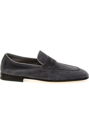 Brunello Cucinelli Mocasines con logo grabado