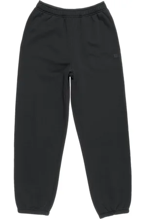 Acne Studios Pantalones joggers con logo bordado