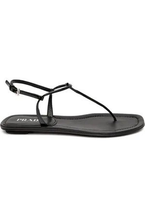 Prada Sandalias planas con tira entre los dedos