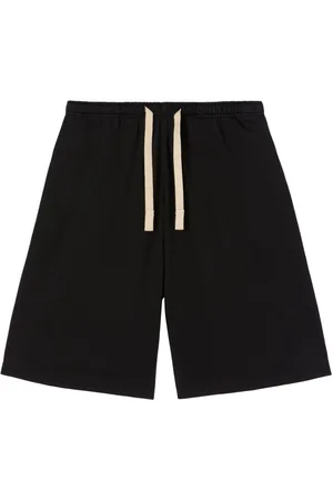 Palm Angels Shorts con motivo de palmeras
