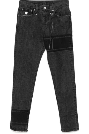 MASTERMIND Vaqueros skinny con logo bordado