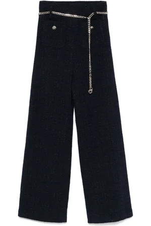 Maje Pantalones con cinturón de cadena