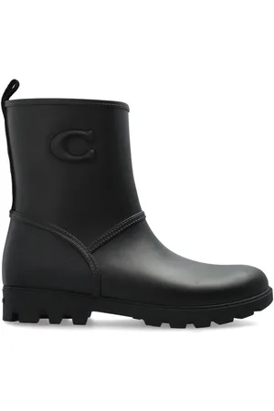 Coach Botas con logo en relieve